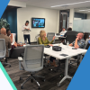People work together around a table