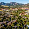 Aerial photo of the University of Colorado Boulder and the Boulder flatirons during summer