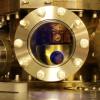A photo of the atomic clock setup complete with the bisecting cavity