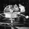 Scientist works on solar satellite  