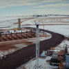 Sensor on a tower at a fossil fuel drilling site