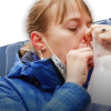 Woman using breathalyzer