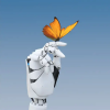 Robotic hand holds a butterfly