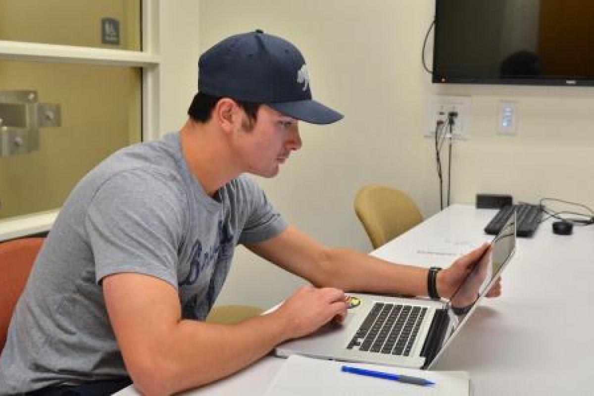 student using a laptop
